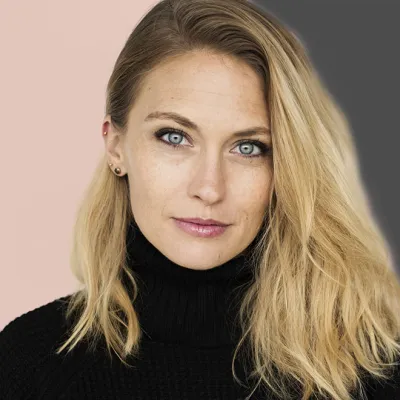 Young woman with healthy skin and a friendly expression