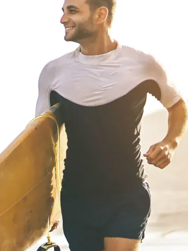 Male torso in a fitted t-shirt showing chest shape