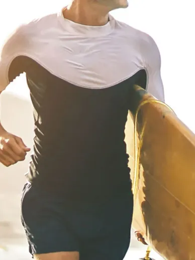 Male torso in a fitted t-shirt showing chest shape