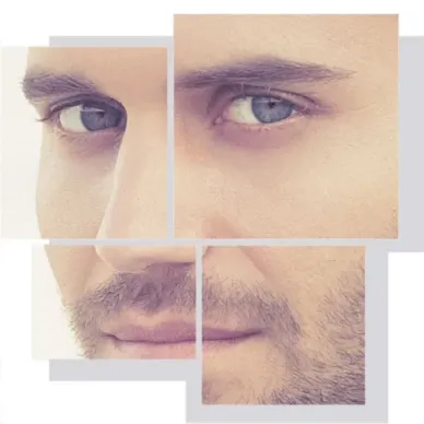 Close-up of a young man’s face with clear and natural skin