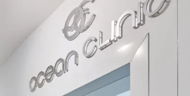 Ocean Clinic Marbella name and logo on the wall